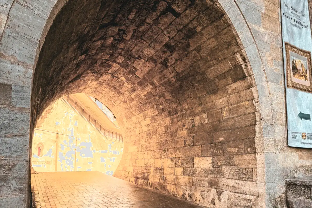 A stone arch in warm daylight